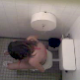 A girl is observed peeing & pooping on a toilet in a public pool restroom. There is audio, but it is difficult to hear her activity. The way she wipes from the front and the back leads us to believe she did both.